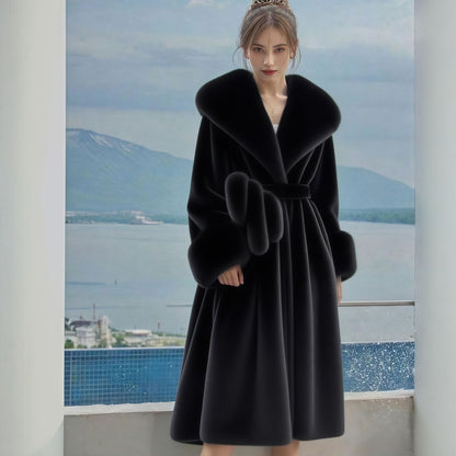 Long women's coat with faux fur collar