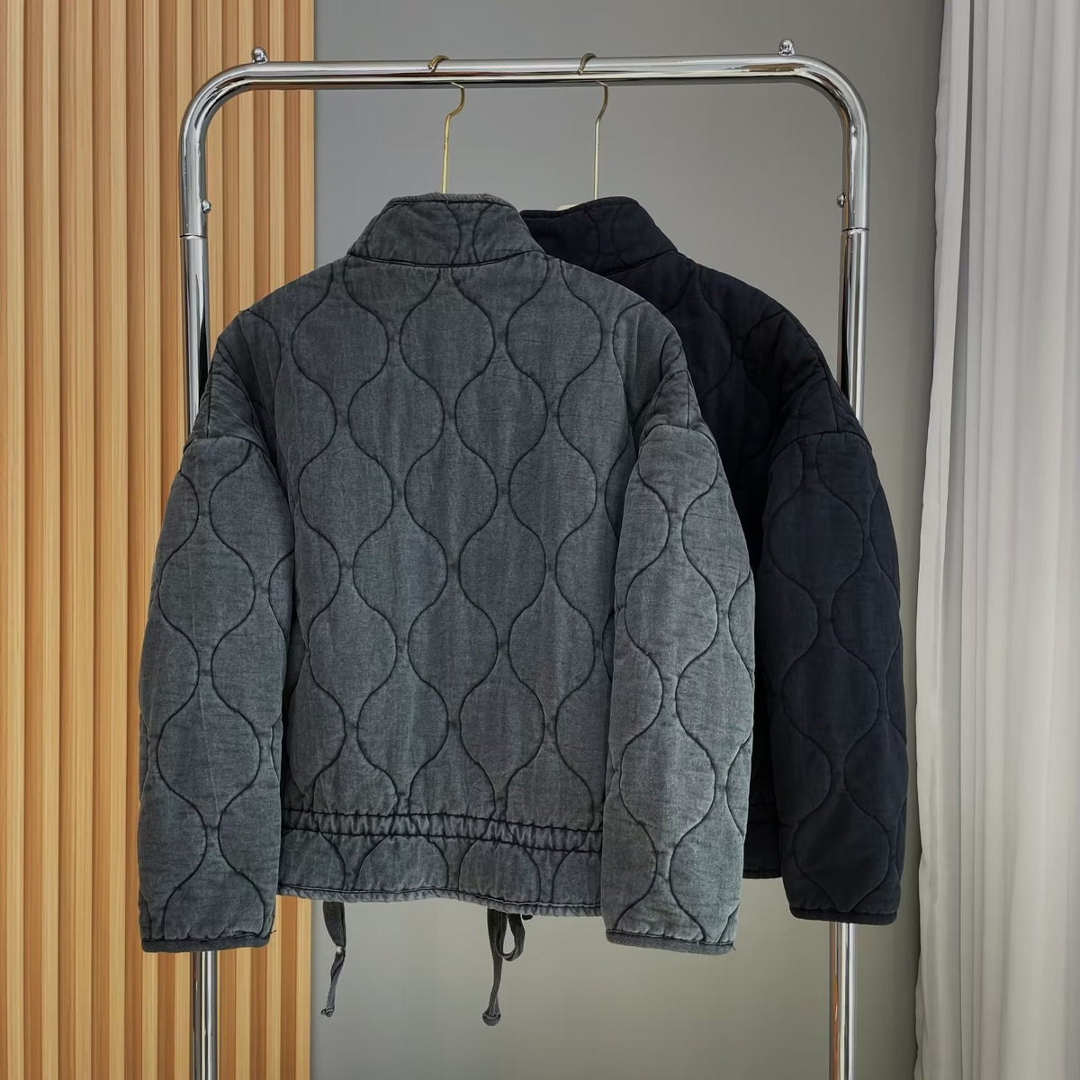 Women’s quilted jacket with stand-up collar and tie belt
