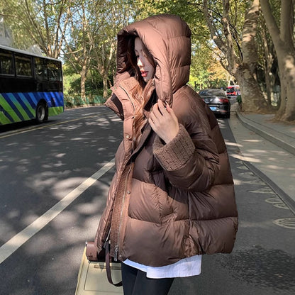 Padded winter jacket with faux sheepskin collar