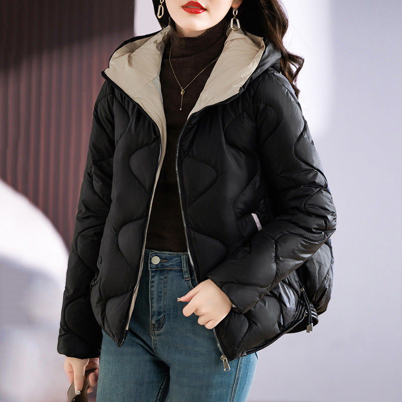 Short women's quilted jacket, shiny, with hood