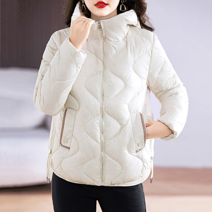 Short women's quilted jacket, shiny, with hood