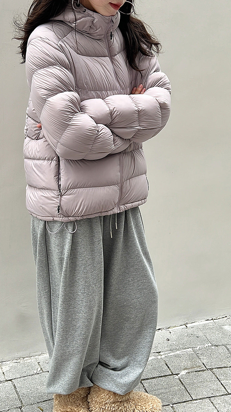 Light women's down jacket with hood, white duck down