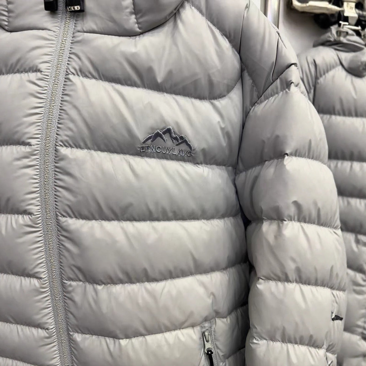 Short women's down jacket with hood