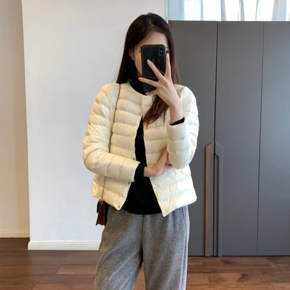 Light women’s down jacket, short, with goose feathers
