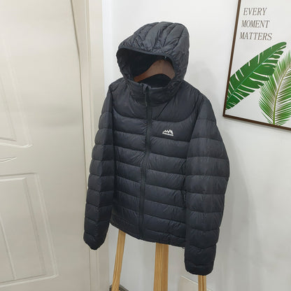 Light women's down jacket with hood, quilted