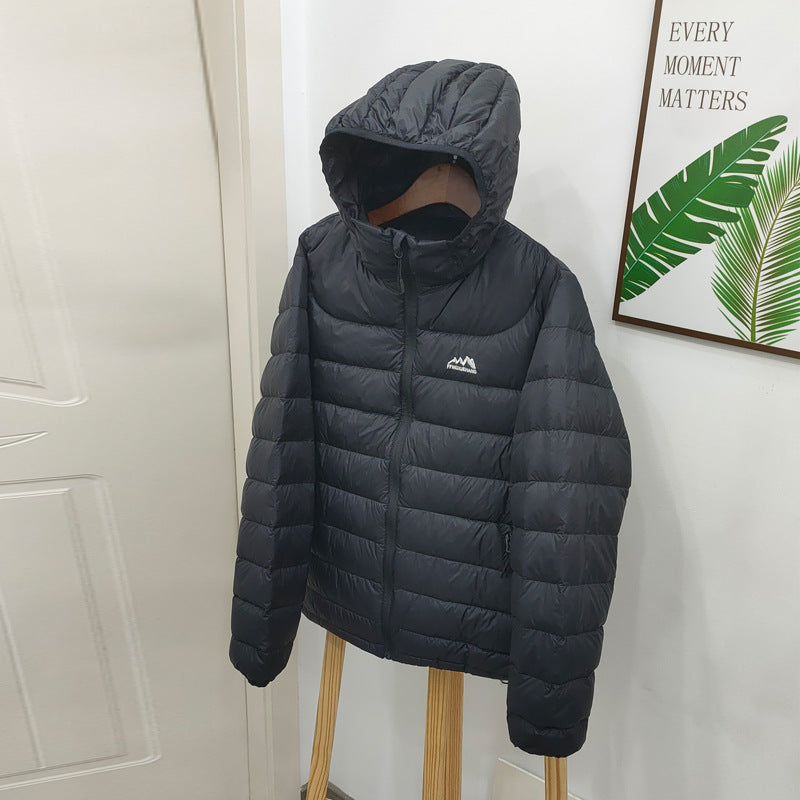 Light women's down jacket with hood, quilted