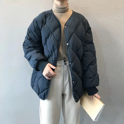 Short women's quilted jacket with diamond pattern