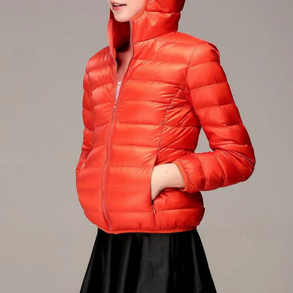 Light women's quilted jacket with hood