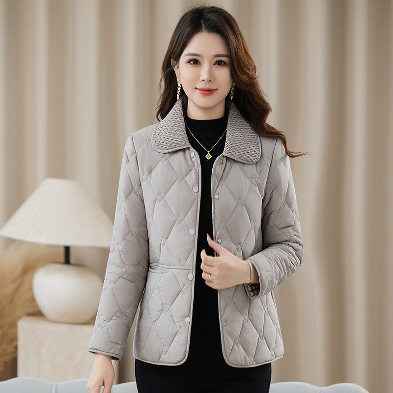 Light women's quilted jacket with shawl collar