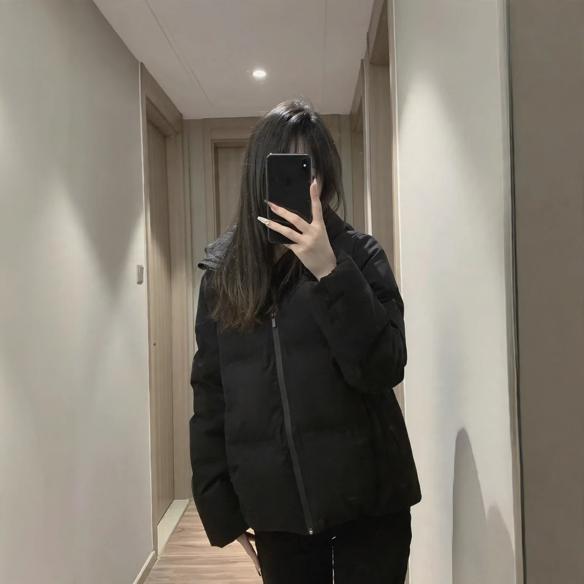 Padded women's winter jacket with hood