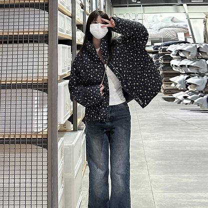 Short women's quilted jacket with stand-up collar and floral pattern