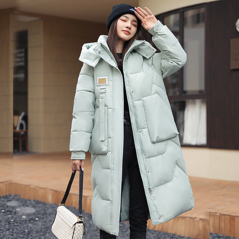 Padded women's winter coat, knee-length, with removable hood