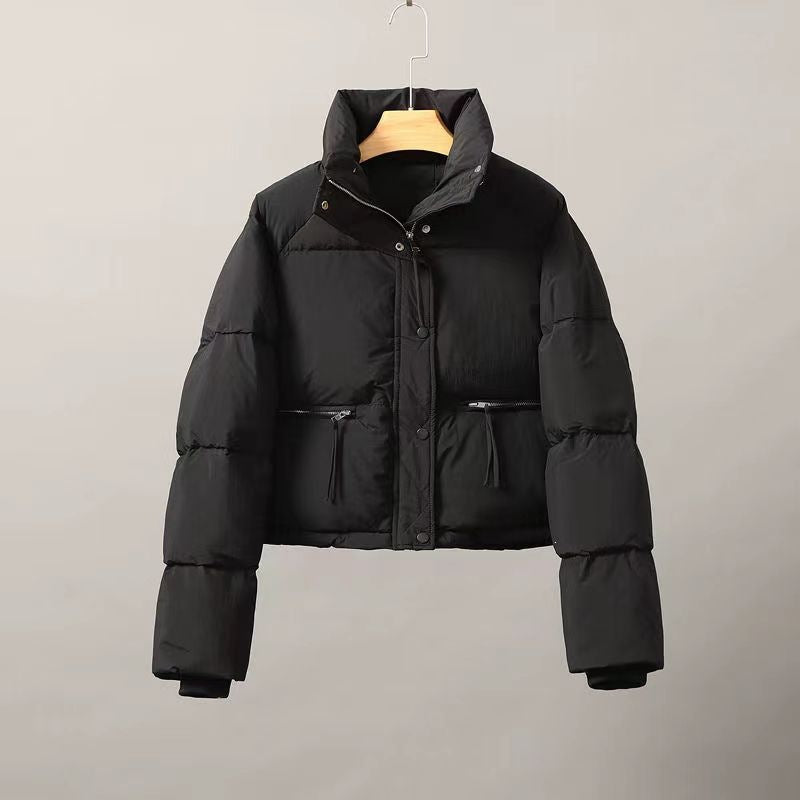 Short women's quilted jacket with stand-up collar