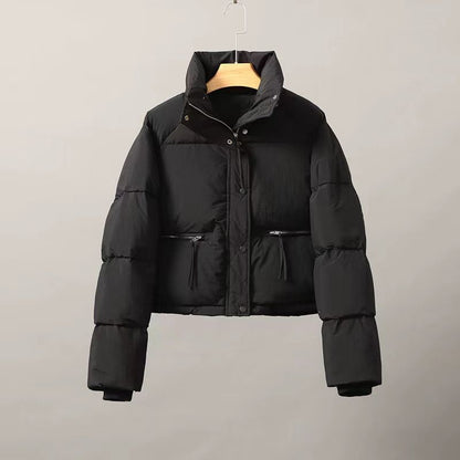 Short women's quilted jacket with stand-up collar