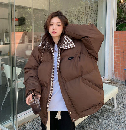 Short, padded women's jacket in oversized style
