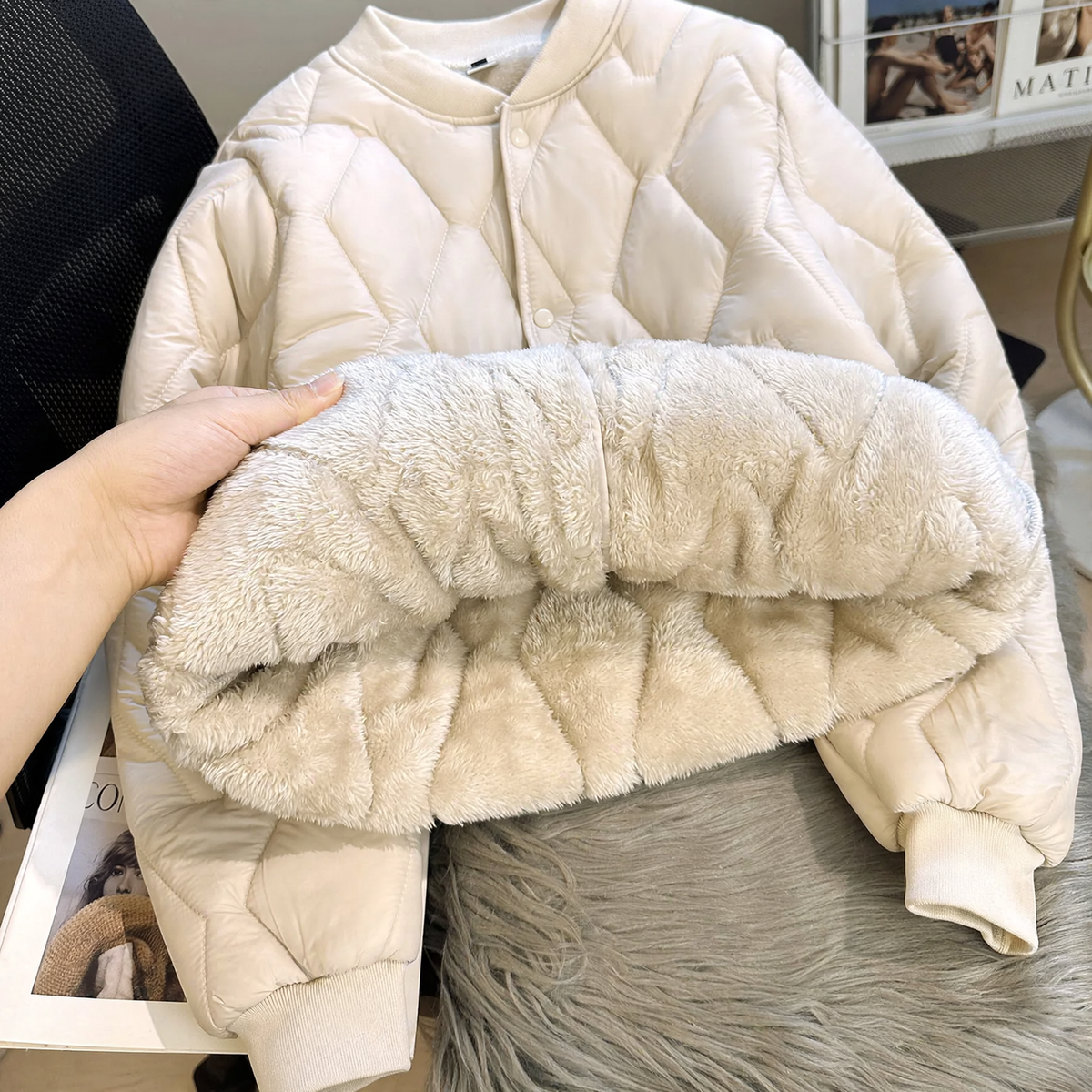 Short women's winter jacket with lamb fleece lining