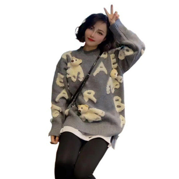 Soft knit sweater with removable bear motif