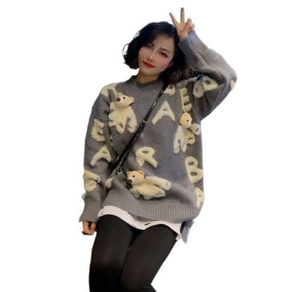 Soft knit sweater with removable bear motif
