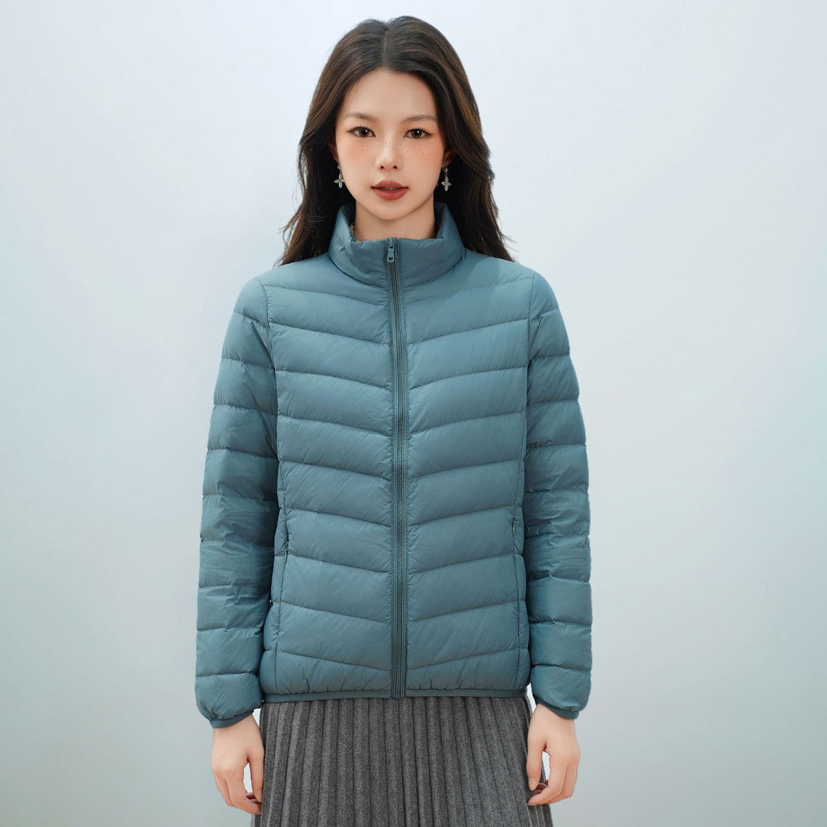 Light women's down jacket with stand-up collar