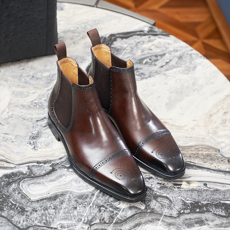 Men's Chelsea boots made of leather, brogue design, round