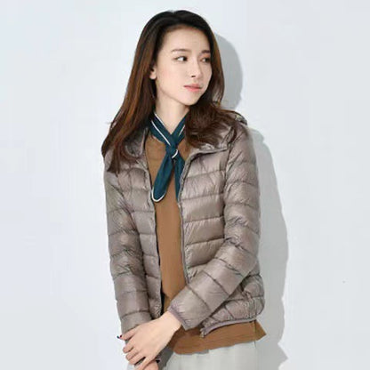 Light women's quilted jacket with hood