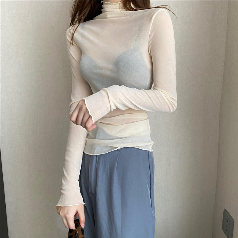 Women's turtleneck top made of lace and mesh fabric