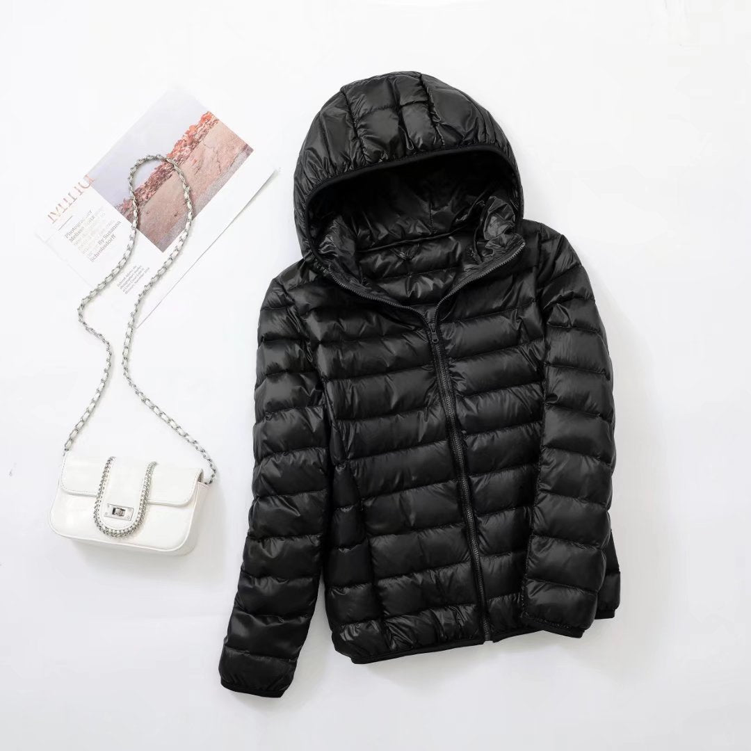 Light women's down jacket with hood, slim fit