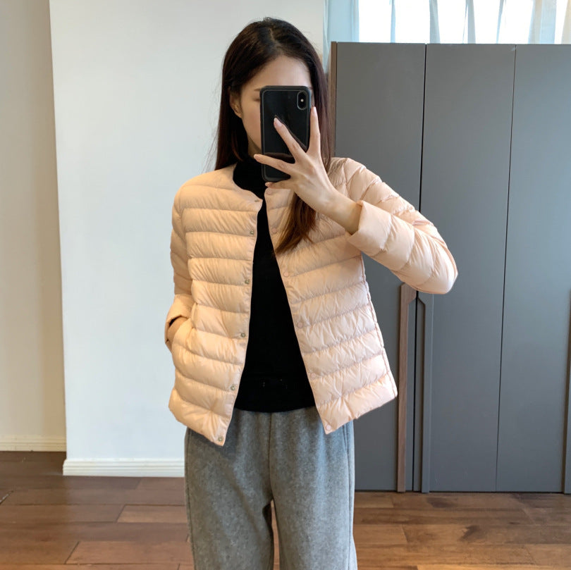 Light women’s down jacket, short, with goose feathers