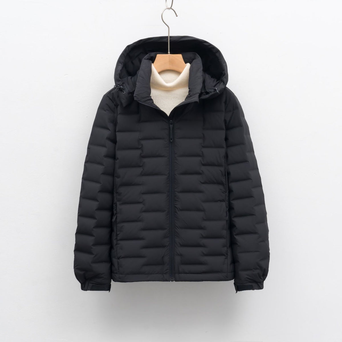 Light women's down jacket with hood, short