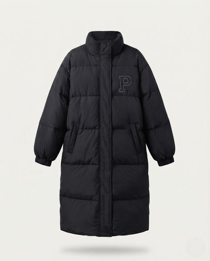 Women's longer boxy thermo puffer with high stand-up collar, college patch, and noise-reducing outer shell