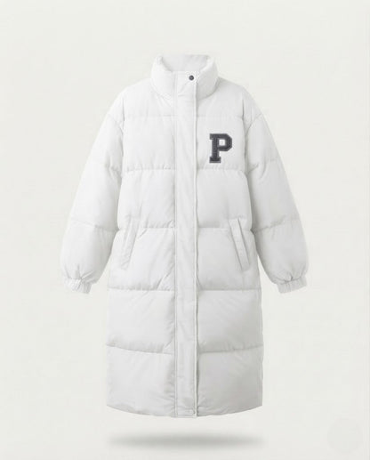Women's longer boxy thermo puffer with high stand-up collar, college patch, and noise-reducing outer shell