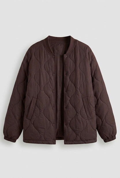 Women's lightweight quilted short jacket with cloud quilt and snap button placket