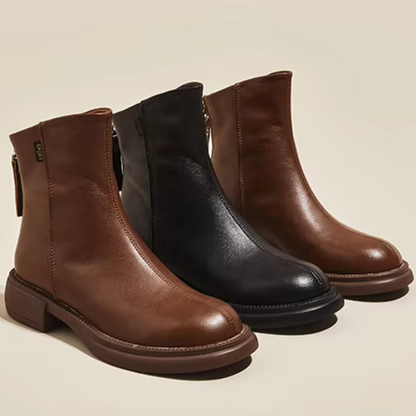 Women's leather ankle boots with back zipper and low heel