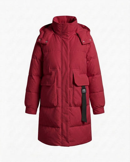 Women's longer padded quilted coat with high stand-up collar, concealed front placket and large patch pockets.