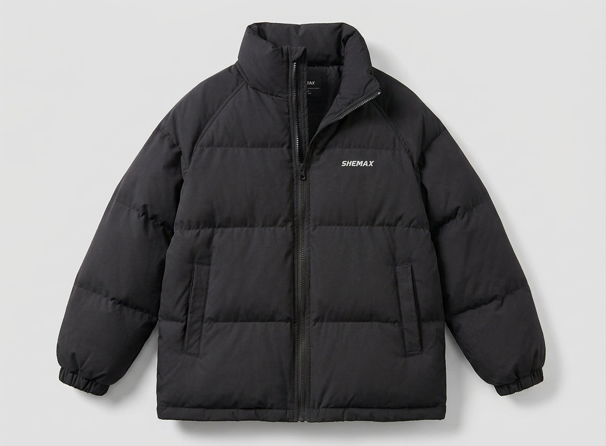 Women's unlined boxy puffer jacket with high stand-up collar, raglan sleeves, and clean logo