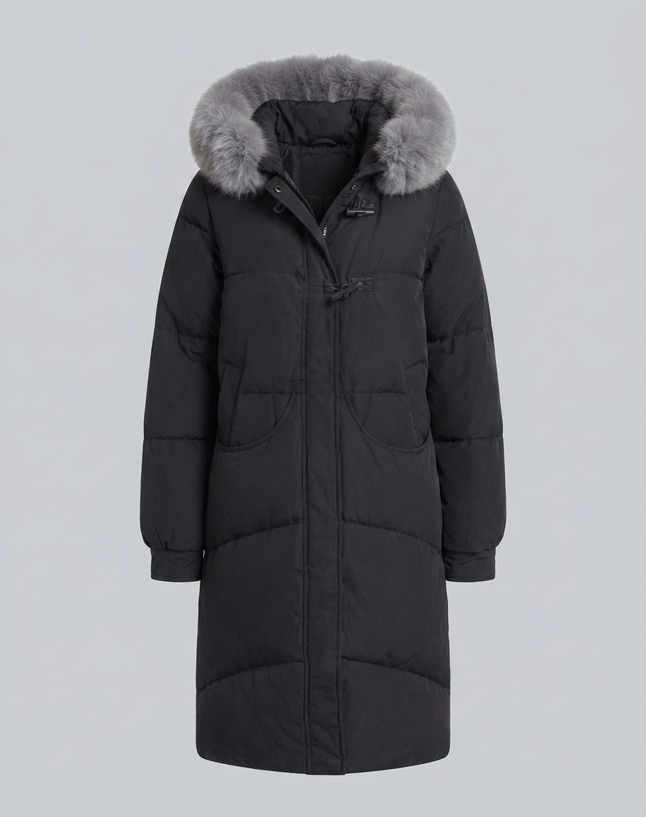 Women’s extra long oversized puffer coat with voluminous hood, removable faux fur trim, and noise-reducing outer material