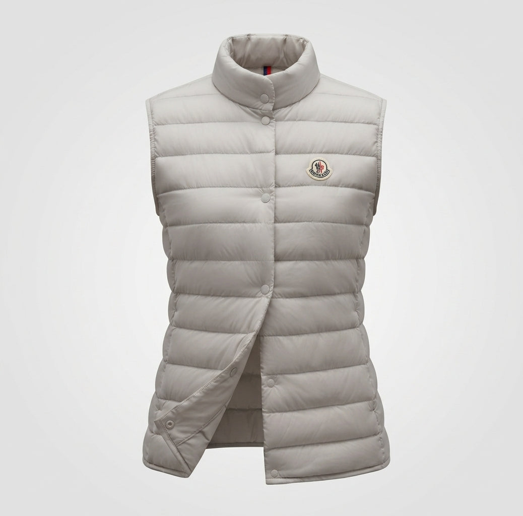 Women’s sleeveless quilted insulation vest with high stand-up collar and concealed snap button placket