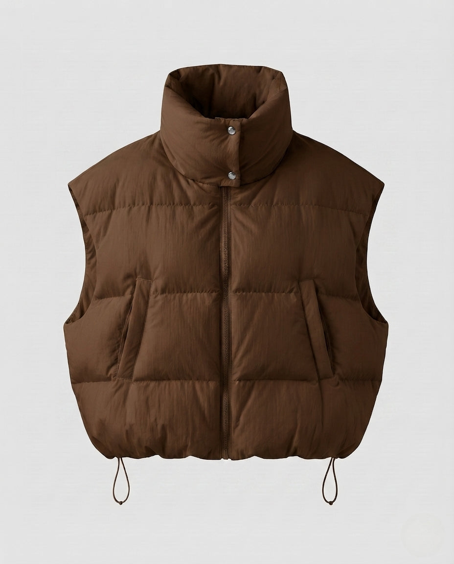 Women’s short padded sleeveless puffer vest with extra high standing collar and drawstring hem