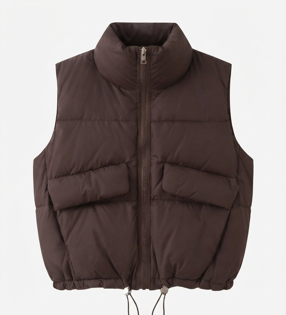 Women's short padded quilted vest with high stand-up collar, two patch flap pockets and adjustable drawstring hem
