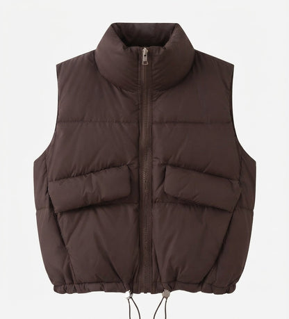 Women's short padded quilted vest with high stand-up collar, two patch flap pockets and adjustable drawstring hem