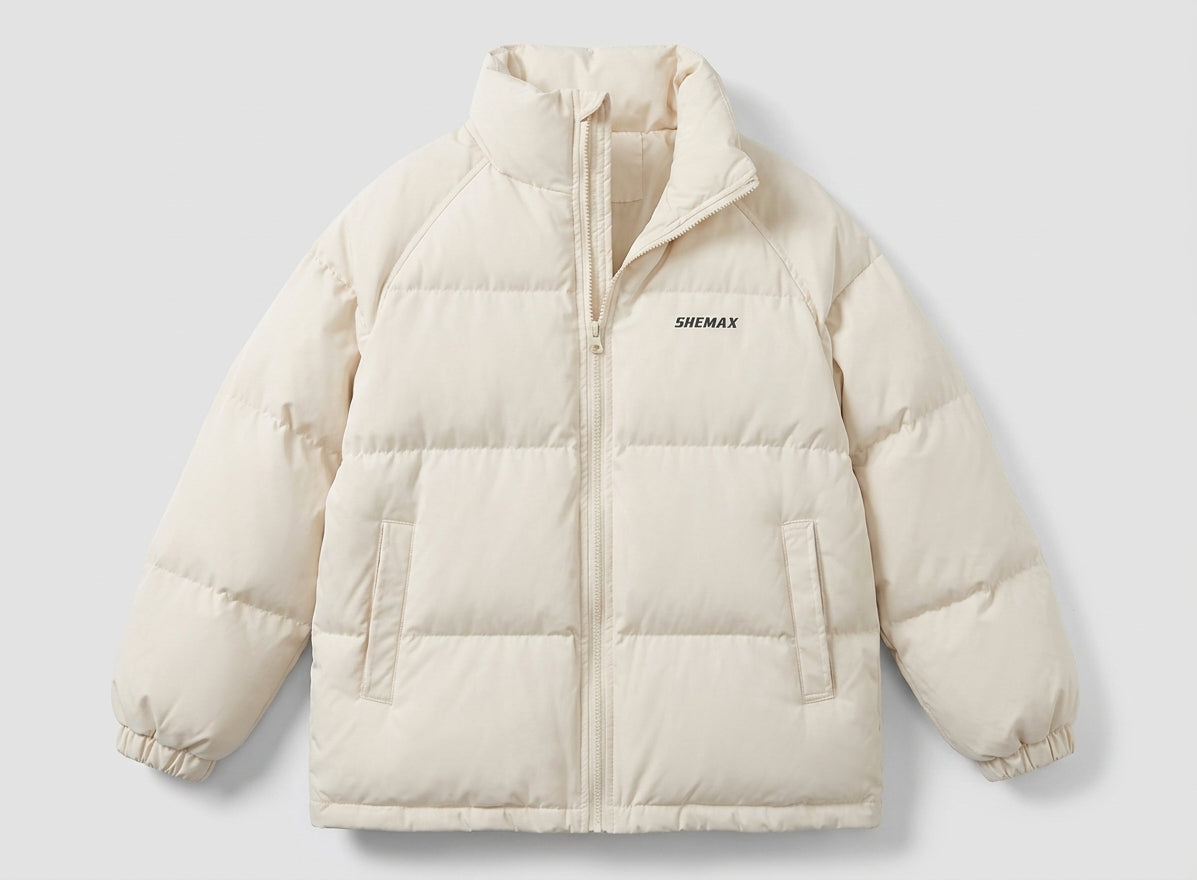 Women's unlined boxy puffer jacket with high stand-up collar, raglan sleeves, and clean logo