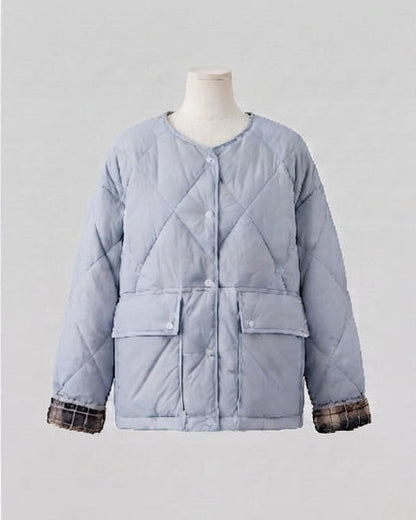 Women's quilted boxy short jacket with concealed snap button placket and extra large patch pockets