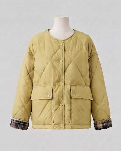 Women's quilted boxy short jacket with concealed snap button placket and extra large patch pockets