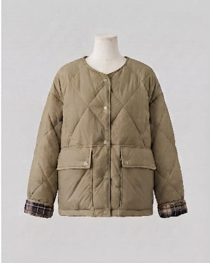 Women's quilted boxy short jacket with concealed snap button placket and extra large patch pockets