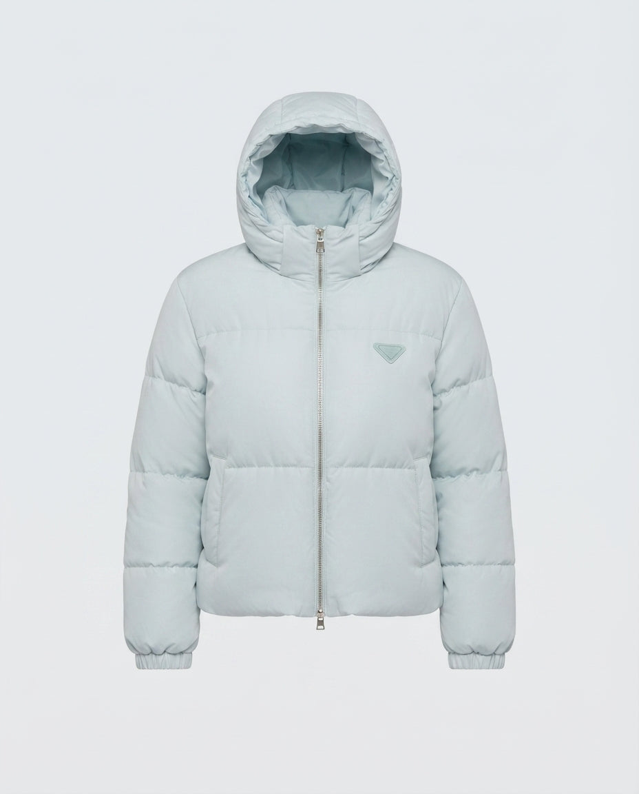 Women's short quilted boxy puffer with hood, adjustable hem and elastic cuffs