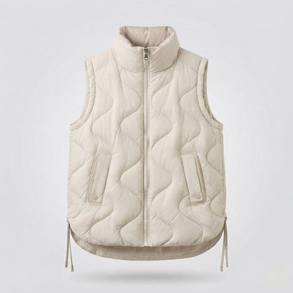 Women's sleeveless microfiber insulation vest with wavy quilting and adjustable drawstring hem