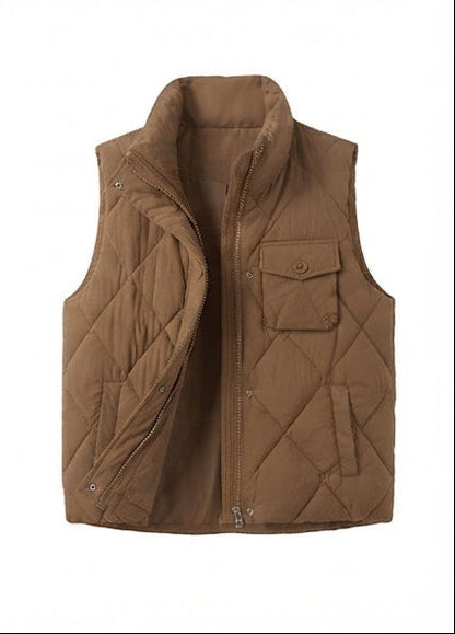 Women's quilted thermal vest with high collar, decorative flap pockets, and adjustable hem
