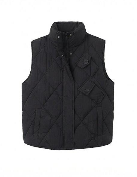 Women's quilted thermal vest with high collar, decorative flap pockets, and adjustable hem
