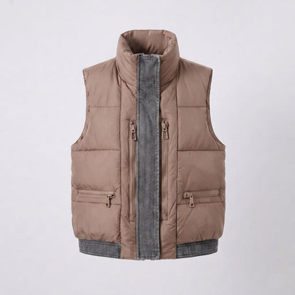 Women's quilted sleeveless quilted vest with high collar, jeans-look inner flap and concealed zipper pockets