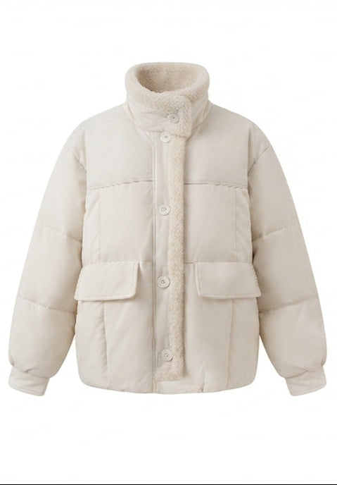 Women's short quilted bomber jacket with teddy lining, faux leather front panels, and patch pockets